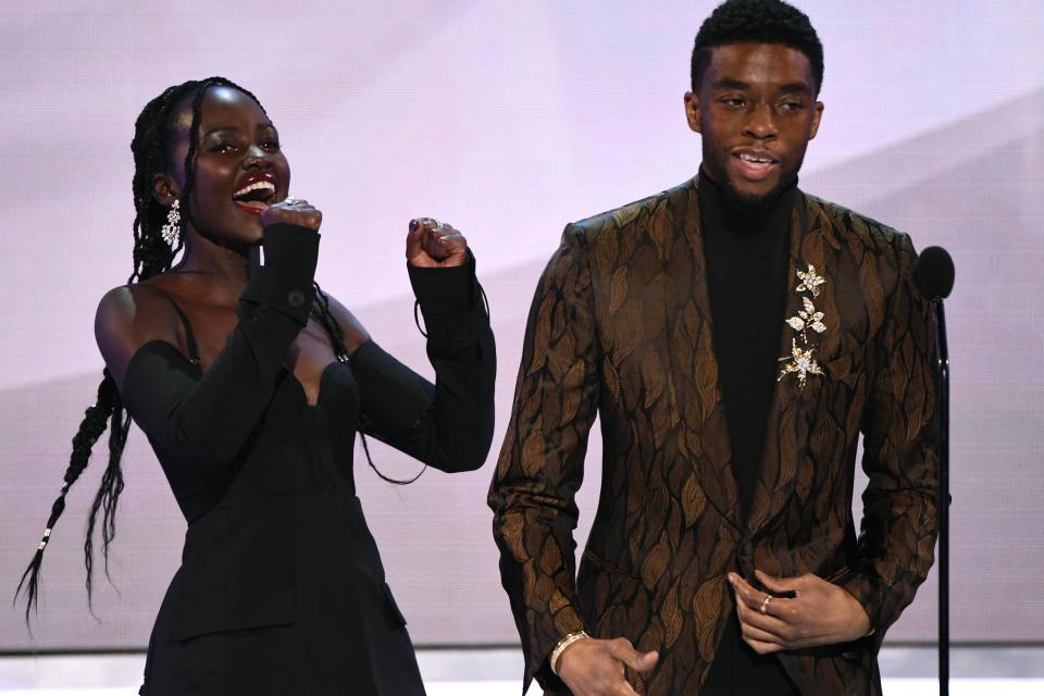 Lupita Nyong’o and Chadwick Boseman take the stage as the cast of "Black Panther" accepts  the award for outstanding cast at the 25th annual Screen Actors Guild Awards in 2019.