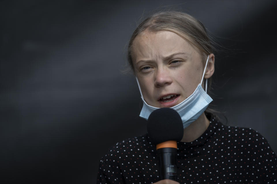 BERLIN, GERMANY - AUGUST 20: Swedish climate activist Greta Thunberg speaks a press conference after the meeting with German Chancellor Angela Merkel on August 20, 2020 in Berlin, Germany. Two years on from her first school strike, 17-year-old climate activist Greta Thunberg is meeting German Chancellor Angela Merkel to deliver a petition letter calling for EU leaders to end investments in the exploration and extraction of fossil fuels. (Photo by Maja Hitij/Getty Images)