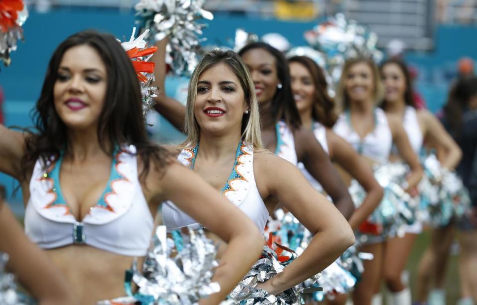<p>Miami Dolphins cheerleaders perform during the first half of an NFL football game against the Pittsburgh Steelers, Sunday, Oct. 16, 2016, in Miami Gardens, Fla. (AP Photo/Wilfredo Lee) </p>