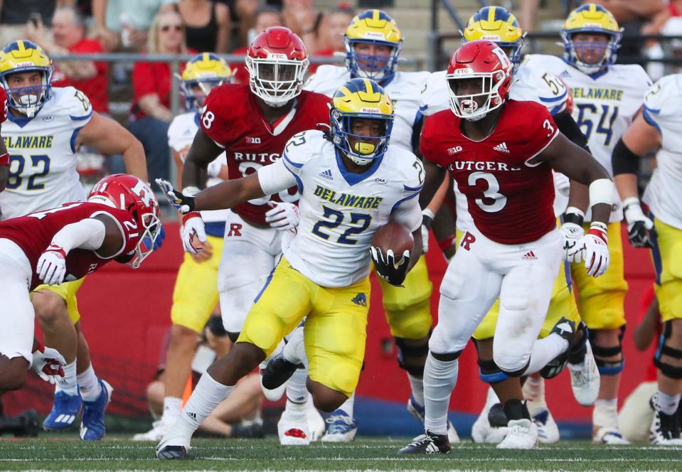 Delaware's Khory Spruill carries in the third quarter of Delaware's 45-13 loss at SHI Stadium in Piscataway, NJ, Saturday, Sept. 18, 2021.