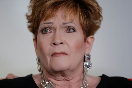 Accuser Beverly Young Nelson sits after making a statement claiming that Alabama senate candidate Roy Moore sexually harassed her when she was 16, in New York, U.S., November 13, 2017. REUTERS/Lucas Jackson