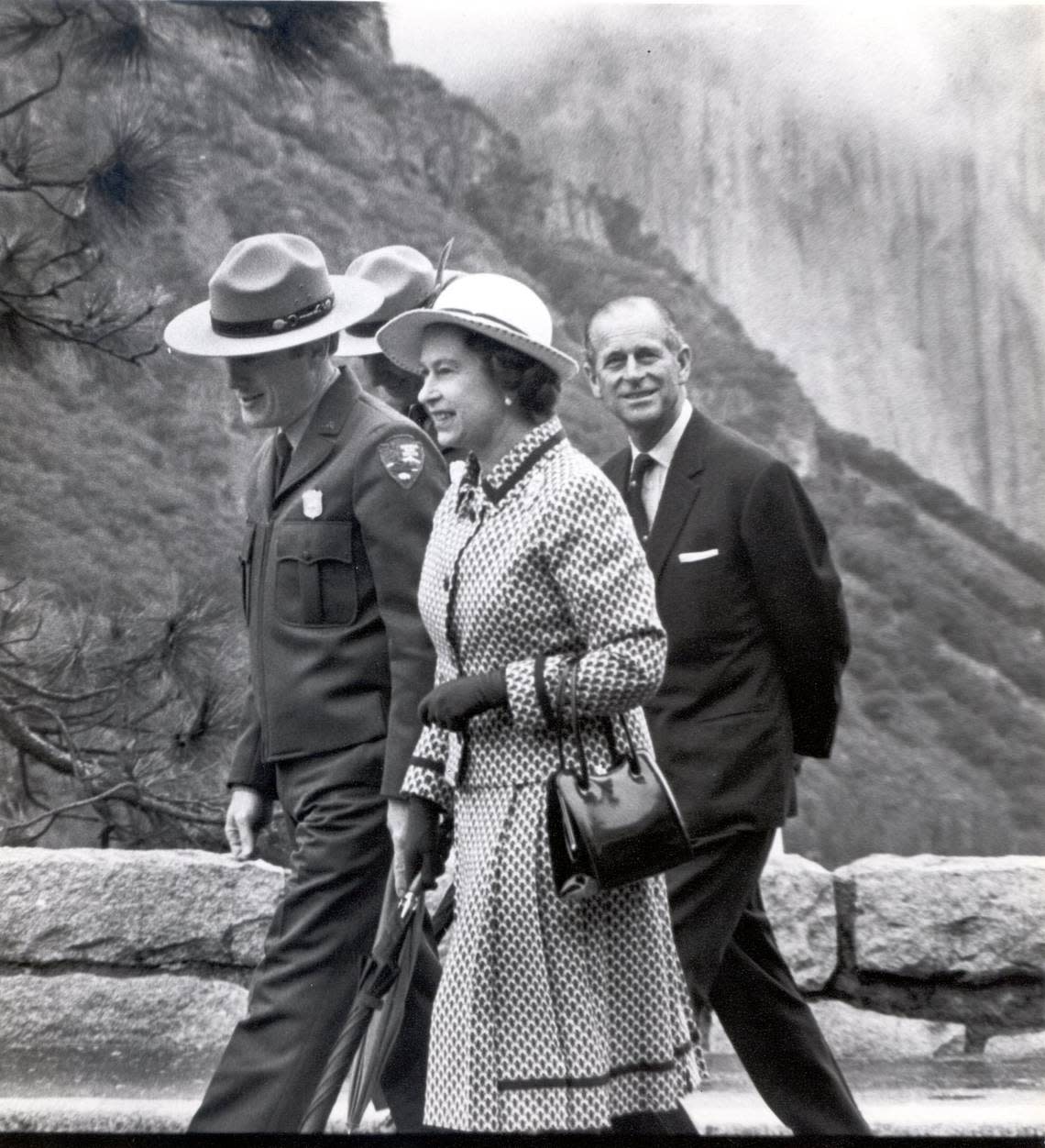 Queen Elizabeth II walks with rangers and her husband, Prince Philip, during her 1983 visit to Yosemite National Park. Richard J. Darby/Fresno Bee archive