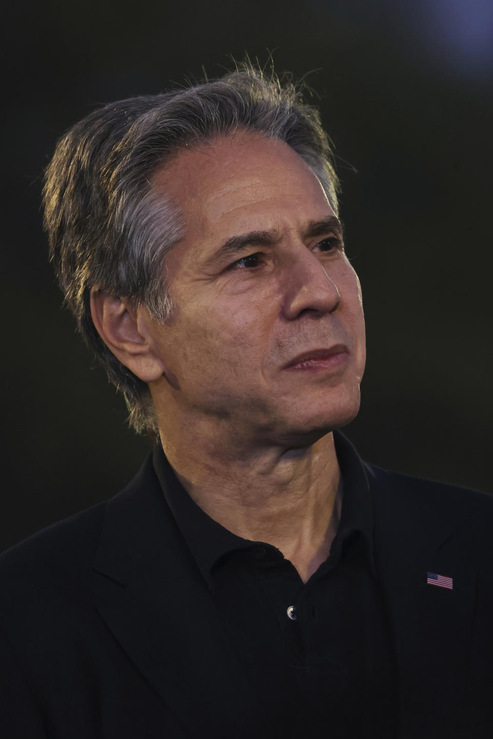 U.S. Secretary of State Anthony Blinken reacts as he listens to a youth representative during a visit to Oxygen Park at Education City, in Doha Qatar, Monday, Nov. 21, 2022. (Karim Jaafar/Pool via AP)