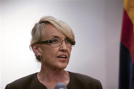 Arizona Governor Jan Brewer makes a statement saying she vetoed the controversial Senate Bill 1062 bill, at Arizona State Capitol in Phoenix February 26, 2014. REUTERS/Samantha Sais