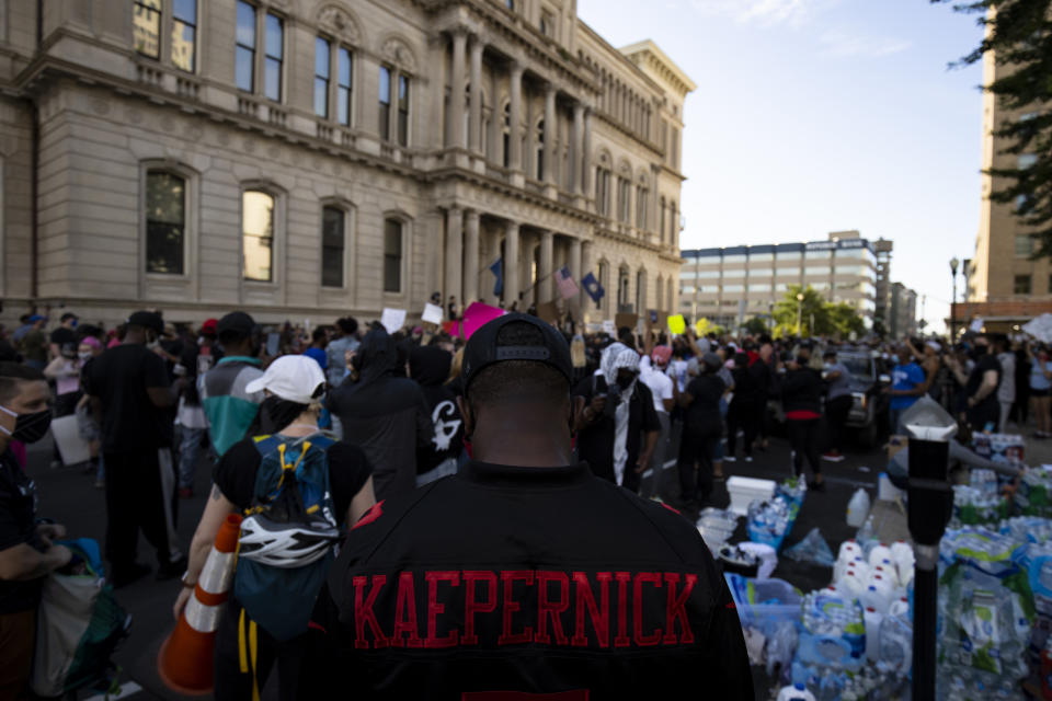 LOUISVILLE, KY - MAY 29: Detail view of a protesters Colin Kaepernick jersey as he and others gather outside city hall on May 29, 2020 in Louisville, Kentucky. Protests have erupted after recent police-related incidents resulting in the deaths of African-Americans Breonna Taylor in Louisville and George Floyd in Minneapolis, Minnesota. (Photo by Brett Carlsen/Getty Images)