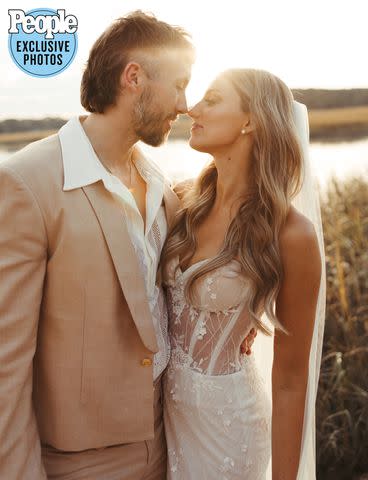 <p>Sydney Breland Photography</p> Kelly Roberson and Halle Kearns pose for a wedding photograph