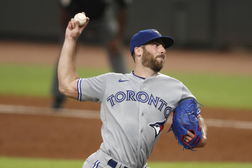 Toronto Blue Jays relief pitcher Anthony Bass (52) works the ninth inning of a baseball game against the Atlanta Braves Wednesday, Aug. 5, 2020, in Atlanta. (AP Photo/John Bazemore)