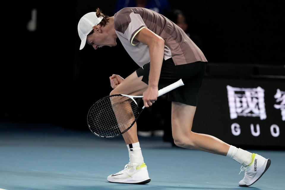 Jannik Sinner of Italy reacts after winning the second set against Andrey Rublev of Russia during their quarterfinal match at the Australian Open tennis championships at Melbourne Park, Melbourne, Australia, Wednesday, Jan. 24, 2024. (AP Photo/Alessandra Tarantino)