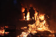 <p>Protesters have set barricades alight on July 7, 2017 in Hamburg, northern Germany. (Ronny Hartmann/AFP/Getty Images) </p>