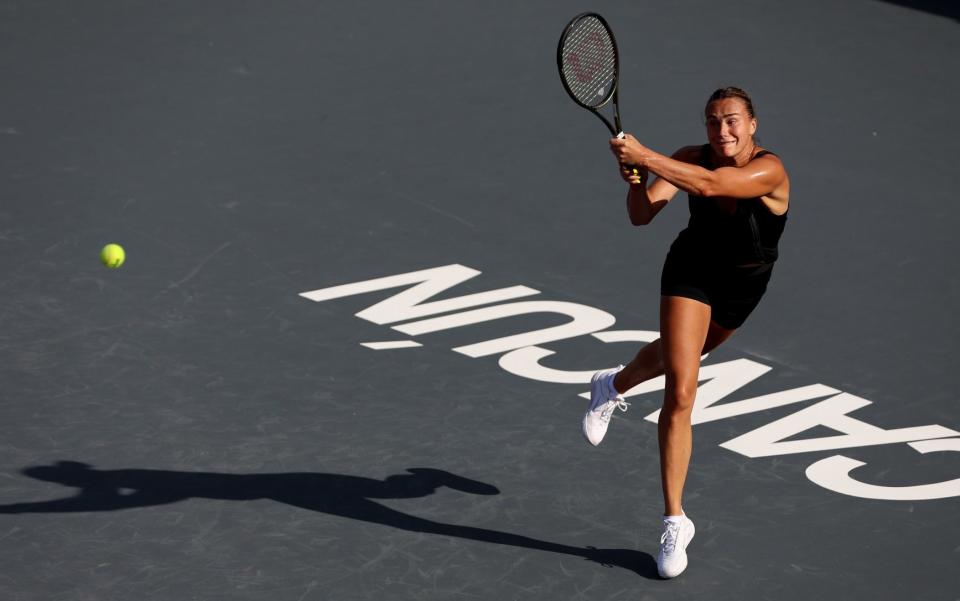 Aryna Sabalenka plays a backhand during a practice session prior to the WTA Finals in Cancun