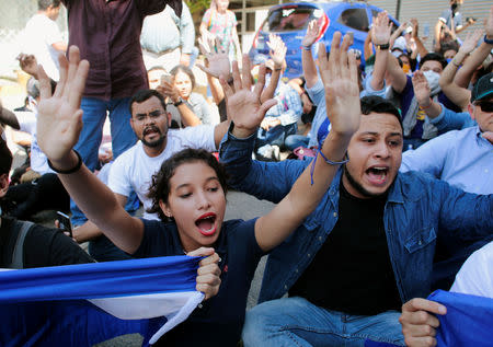 Demonstrators shouts slogans during a march to mark the one year anniversary of the protests against Nicaraguan President Daniel Ortega's government in Managua, Nicaragua April 17, 2019.REUTERS/Oswaldo Rivas