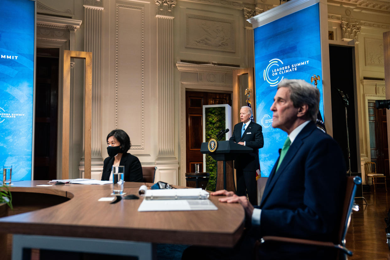 WASHINGTON, DC - APRIL 23: U.S. President Joe Biden delivers remarks as U.S. Trade Representative Katherine Tai and Special Presidential Envoy for Climate and former Secretary of State John Kerry listen during day 2 of the virtual Leaders Summit on Climate at the East Room of the White House April 23, 2021 in Washington, DC. Biden pledged to cut greenhouse gas emissions by half by 2030. (Photo by Anna Moneymaker-Pool/Getty Images)