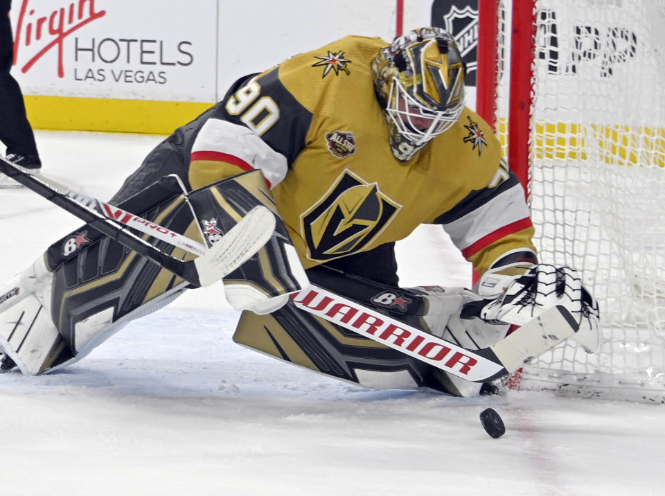 Vegas Golden Knights goaltender Robin Lehner (90) makes a save against the Chicago Blackhawks during the first period of an NHL hockey game Saturday, Jan. 8, 2022, in Las Vegas. (AP Photo/David Becker)