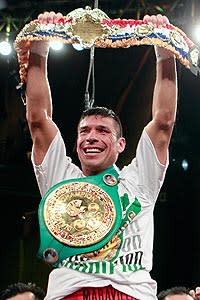 Sergio Martinez (shown) celebrates after defeating Sergiy Dzinziruk in their WBC middleweight title fight in March '11