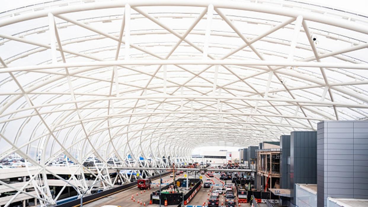 <div>Land vehicles arrive at the departure level of the International Terminal of Hartsfield-Jackson Atlanta International Airport. (Photo by Alex Tai/SOPA Images/LightRocket via Getty Images)</div>