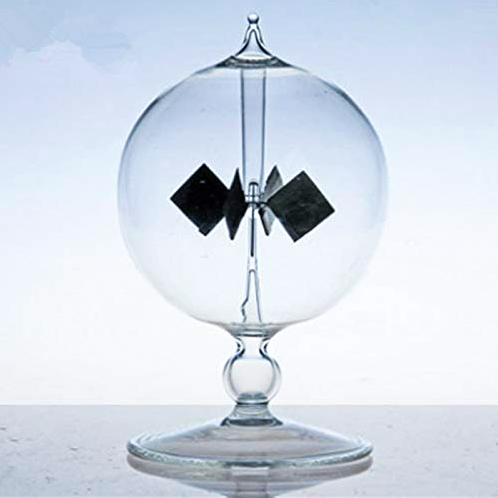 A Crookes radiometer, a glass orb with four paddles inside.