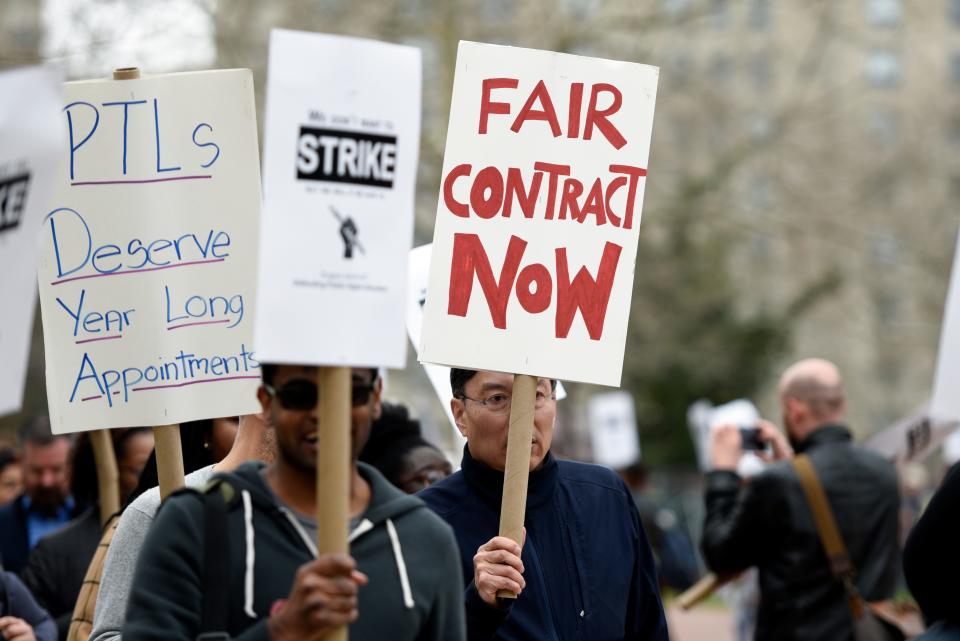 Full-time faculty, grad students, and adjunct professors rally for the Rutgers Board of Governors to meet their contract demands, which include equal pay, higher salaries, and more full-time faculty hires, on Tuesday, April 9, 2019, in Newark.