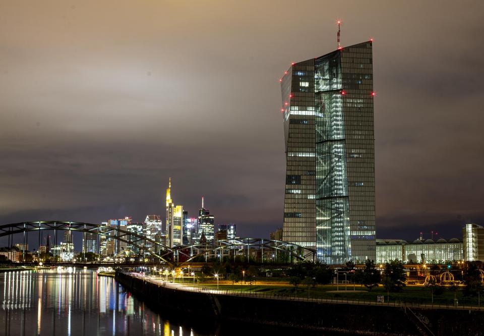 The European Central Bank stands next the buildings of the banking district in Frankfurt, Germany, Tuesday, Sept. 17, 2019. (AP Photo/Michael Probst)