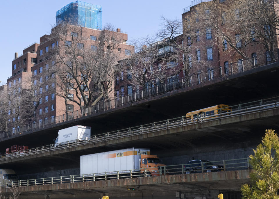 Vehicles drive along the Brooklyn Queens Expressway, part of the city's aging infrastructure, beneath the Brooklyn Heights promenade, Tuesday, April 6, 2021, in New York. With an appeal to think big, President Joe Biden is promoting his $2.3 trillion infrastructure plan directly to Americans. Republicans oppose Biden's American Jobs Plan as big taxes, big spending and big government. (AP Photo/Mark Lennihan)