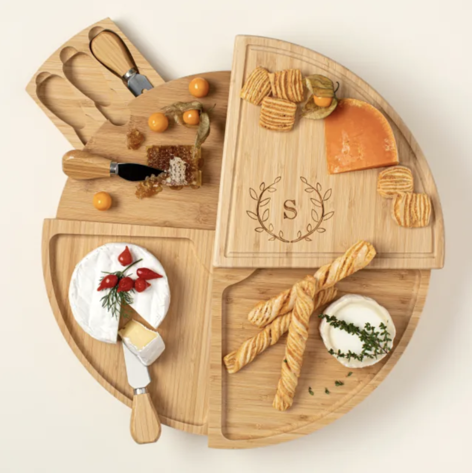 9) Personalized Compact Swivel Cheese Board