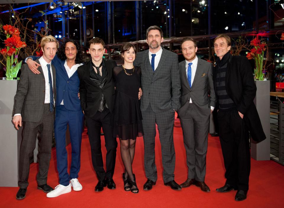 Director Sebastian Schipper (3rd R) and cast members, Max Mauff (L-R), Burak Yigit, Franz Rogowski, Laia Costa, Frederick Lau and Andre Hennicke, arrive on the red carpet for the screening of the in competition movie "Victoria" at the 65th Berlinale International Film Festival in Berlin February 7, 2015. REUTERS/Stefanie Loos (GERMANY - Tags: ENTERTAINMENT)