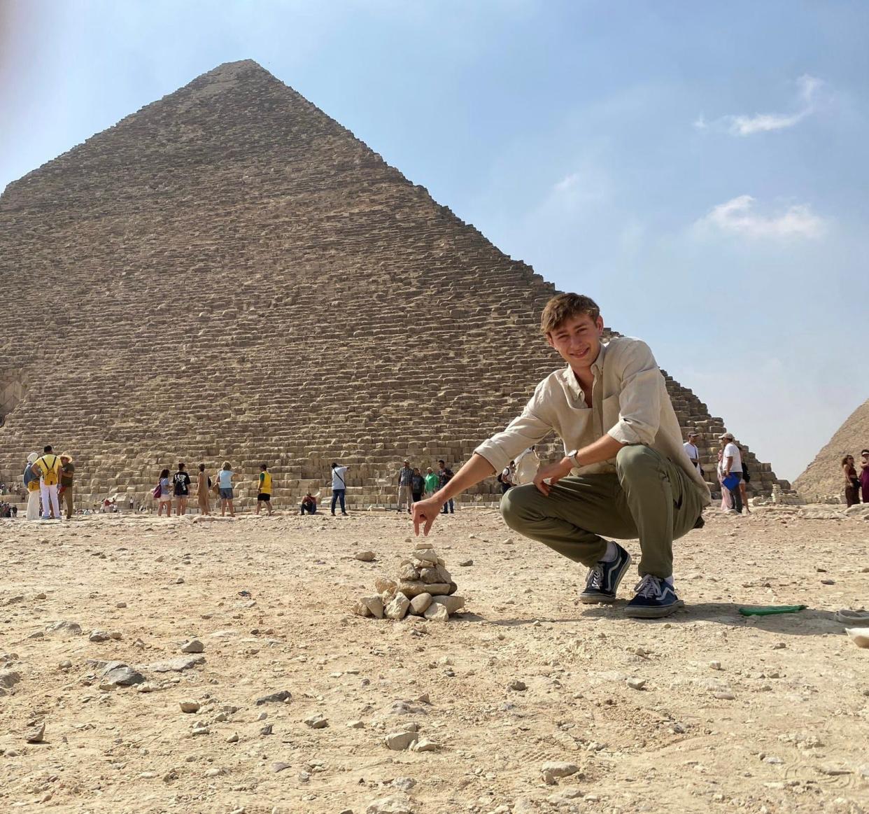 Benjamin Murray at the pyramids in Egypt while studying at the American University of Cairo.