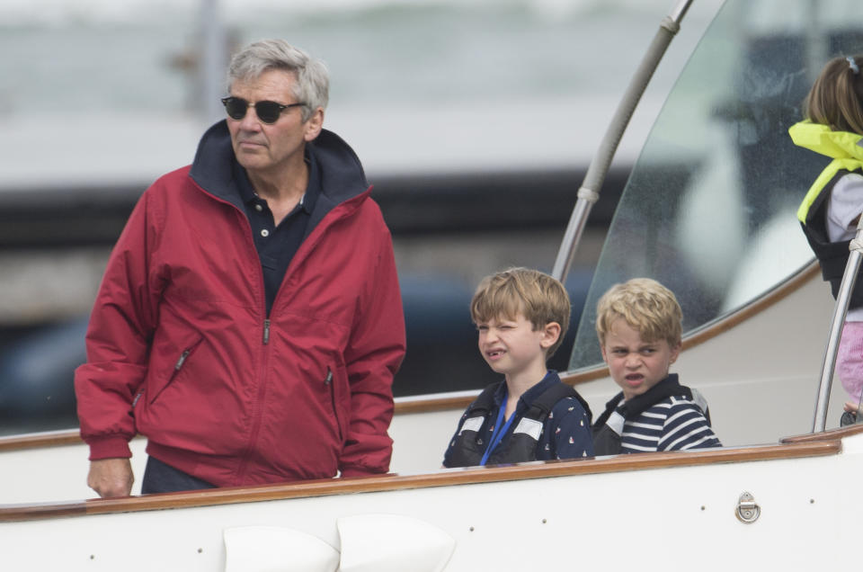 COWES, ENGLAND - AUGUST 08: Michael Middleton (L) with Prince George (R) at The Royal Yacht Squadron during the inaugural Kings Cup regatta hosted by the Duke and Duchess of Cambridge on August 08, 2019 in Cowes, England. Their Royal Highnesses hope that The Kings Cup will become an annual event bringing greater awareness to the wider benefits of sport, whilst also raising support and funds for Action on Addiction, Place2Be, the Anna Freud National Centre for Children and Families, The Royal Foundation, Child Bereavement UK, Centrepoint, Londonís Air Ambulance Charity and Tusk. on August 08, 2019 in Cowes, England. (Photo by Antony Jones/Getty Images)