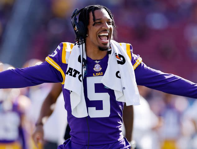 <p>Joe Robbins/Icon Sportswire/Getty</p> Jayden Daniels during the ReliaQuest Bowl against the Wisconsin Badgers on January 1, 2024.