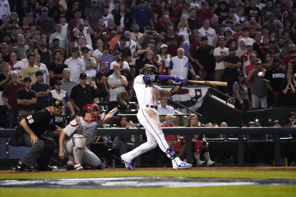 Arizona Diamondbacks second baseman Ketel Marte (4) hits a walk-off single against the Philadelphia Phillies in Game 3 of the NLCS of the 2023 MLB playoffs at Chase Field in Phoenix on Oct. 19, 2023.