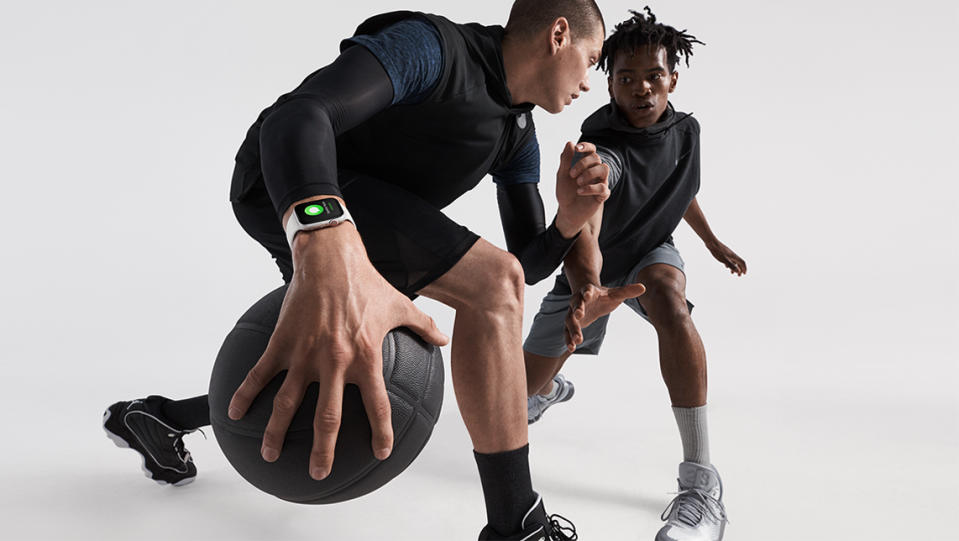 People playing basketball while wearing Apple Watch