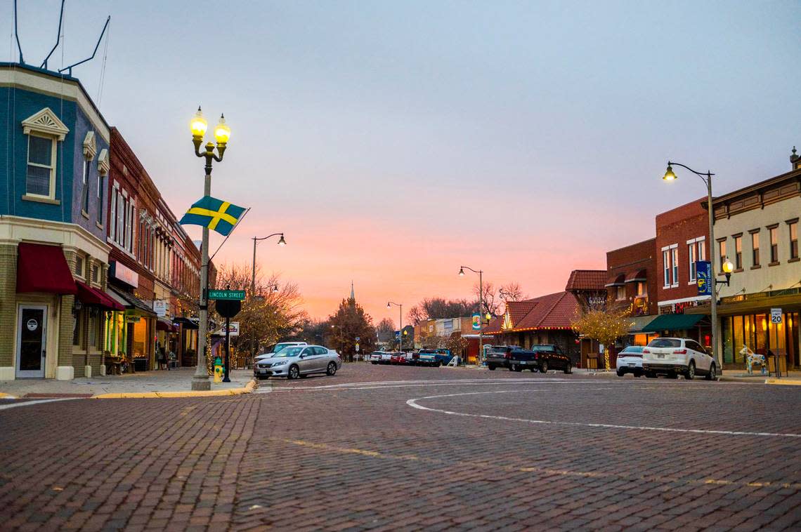 A Swedish flag hangs on a light pole on the corner of Main Street and Lincoln Street in downtown Lindsborg, Kansas. Emily Curiel/ecuriel@kcstar.com