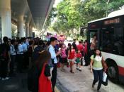 Commuters boarding a free shuttle bus outside Bishan SMRT station. (Yahoo! photo)