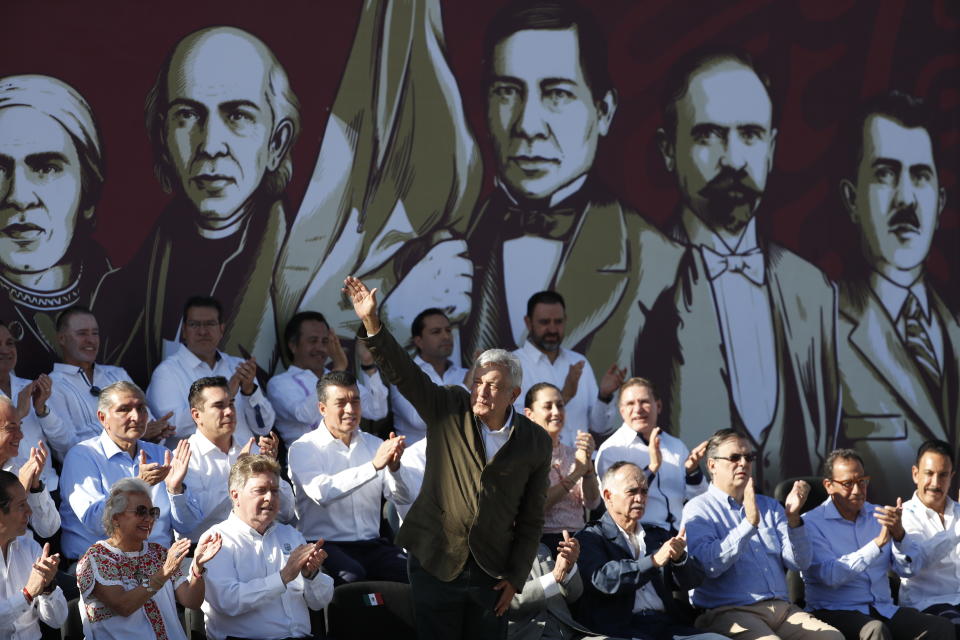 Mexican President Andres Manuel Lopez Obrador waves to the crowd during a rally in Tijuana, Mexico, Saturday, June 8, 2019. Lopez Obrador held a rally in Tijuana even as President Trump has put on hold his plan to begin imposing tariffs on Mexico on Monday, saying the U.S. ally will take "strong measures" to reduce the flow of Central American migrants into the United States. (AP Photo/Eduardo Verdugo)