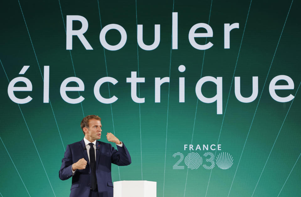 French President Emmanuel Macron speaks during the presentation of "France 2030" investment plan at the Elysee Palace in Paris, Tuesday Oct. 12, 2021.French President Emmanuel Macron details the priority sectors of the "France 2030" plan to "bring out the champions of tomorrow". Behind reads: Electric drive. (Ludovic Marin, Pool Photo via AP)