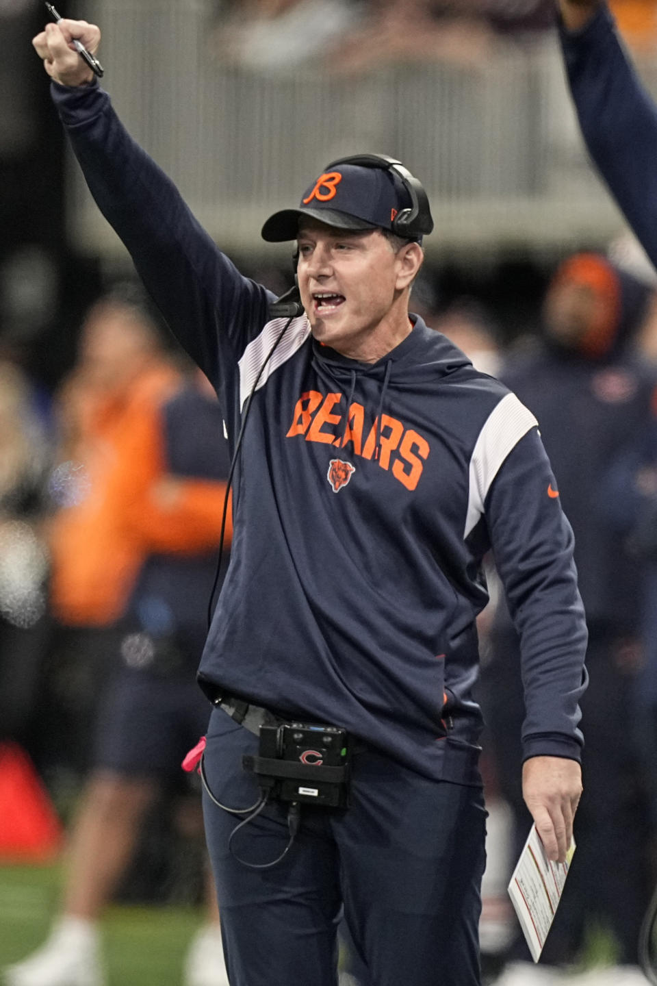 Chicago Bears head coach Matt Eberflus speaks to players during the first half of an NFL football game against the Atlanta Falcons, Sunday, Nov. 20, 2022, in Atlanta. (AP Photo/Brynn Anderson)