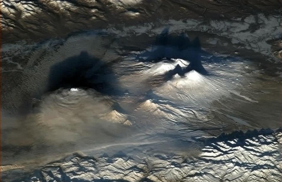 'Volcanoes look dramatic at dawn. They startled me when I spotted them through the lens,' Tweeted Hadfield. The images were all taken using the Station's Nikon cameras. 'Space Station cameras are Nikon D2 and D3, with a variety of lenses out to 400. We can even take them out into the vacuum,' says Hadfield.