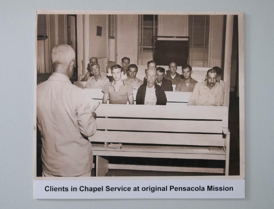 Vintage photos are displayed at the Waterfront Rescue Mission in Pensacola on Thursday, Oct. 26, 2023. Waterfront is celebrating its 75th anniversary.