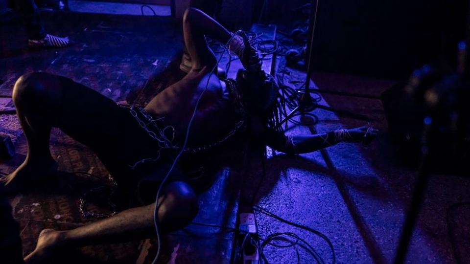 The singer of the black metal band Chovu performs during the Undertow concert held in Nairobi on March 16, 2024.