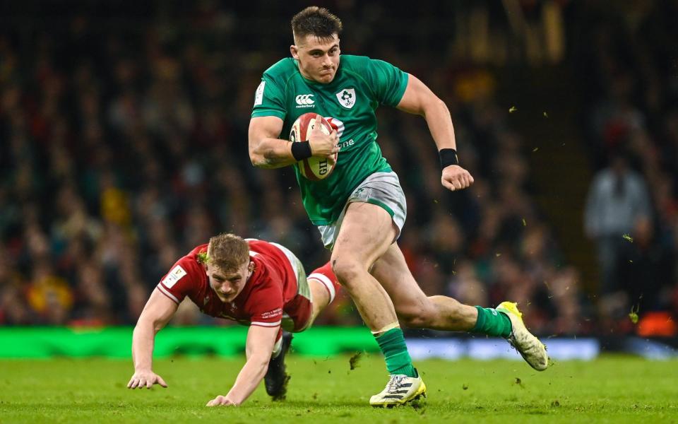 Dan Sheehan of Ireland evades the tackle of Jac Morgan of Wales during the Guinness Six Nations Rugby Championship match between Wales and Ireland - Getty Images/Brendan Moran