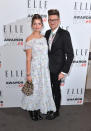 <p>Pixie looked like she was off to a summer fete in a Saint Laurent floral frock, while designer Henry Holland looked as dapper as ever in a black suit and graphic print shirt. <i>[Photo: Getty]</i><br></p>