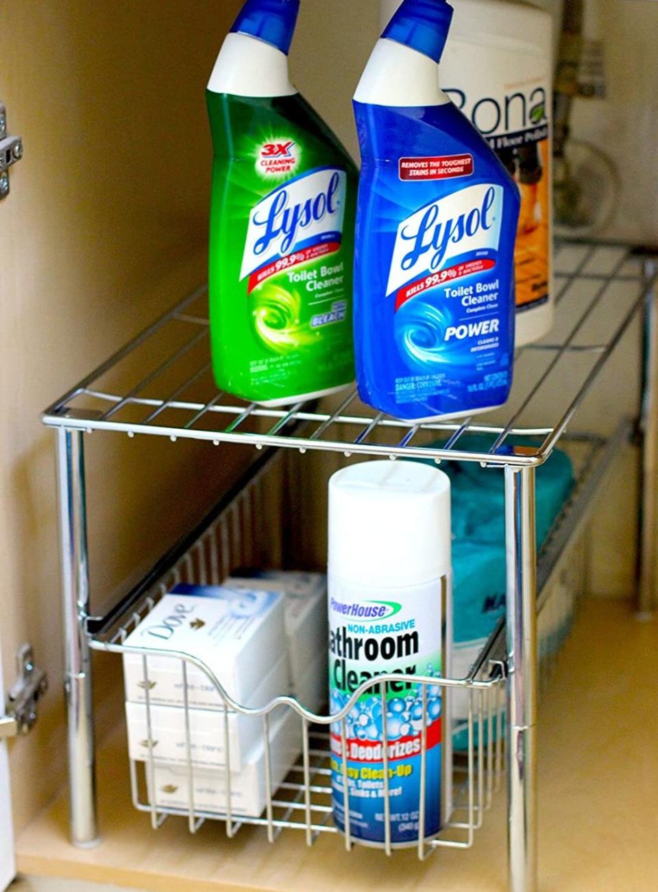 It features a shelf on top so you can double up your storage space &mdash; especially great if you have reaaaally small cabinets.<br /><br /><strong>Promising review:</strong> "These are nice pieces that helped me organize underneath my bathroom sink! They fit perfectly! <strong>After organizing everything, I was so surprised I had so much more room that I grabbed more items out of the linen closet to fill it up.</strong> I still have a lot of room left. I bought these based off the high ratings and they hold true. (This is Brad's wife.)" &mdash;<a href="https://amzn.to/3ahYd4n" target="_blank" rel="nofollow noopener noreferrer" data-skimlinks-tracking="5723569" data-vars-affiliate="Amazon" data-vars-href="https://www.amazon.com/gp/customer-reviews/R18X2W0VAIZLRE?tag=bfjasmin-20&amp;ascsubtag=5723569%2C25%2C31%2Cmobile_web%2C0%2C0%2C14870753" data-vars-keywords="cleaning" data-vars-link-id="14870753" data-vars-price="" data-vars-product-id="16022118" data-vars-retailers="Amazon">Brad J. Leahy</a><br /><br /><strong>Get it from Amazon for <a href="https://amzn.to/2QclePp" target="_blank" rel="noopener noreferrer">$26.97</a> (available in two finishes).</strong>