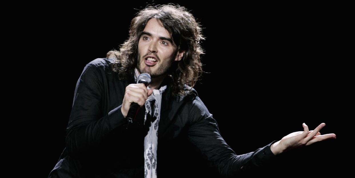 russell brand performs at the teenage cancer trust