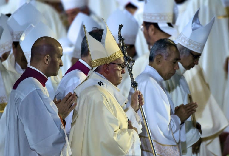 Pope Francis (C) at an open-air mass at the Guadalupe Basilica in Mexico City, on February 13, 2016