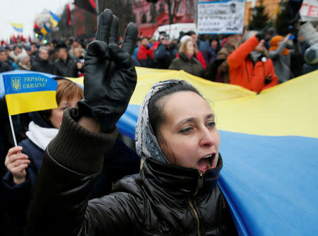 Supporters of former Georgian President Mikheil Saakashvili march through the city centre during a rally in Kiev, Ukraine December 10, 2017. REUTERS/Gleb Garanich