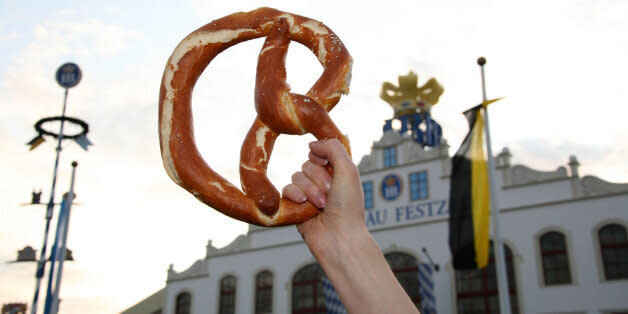 MUNICH, GERMANY - SEPTEMBER 21:  A woman waves a pretzel in the air during day 2 of the Oktoberfest beer festival on September 21, 2008 in Munich, Germany. The Oktoberfest is seen as the biggest beer festival worldwide.  (Photo by Chad Buchanan/Getty Images) (Photo: )