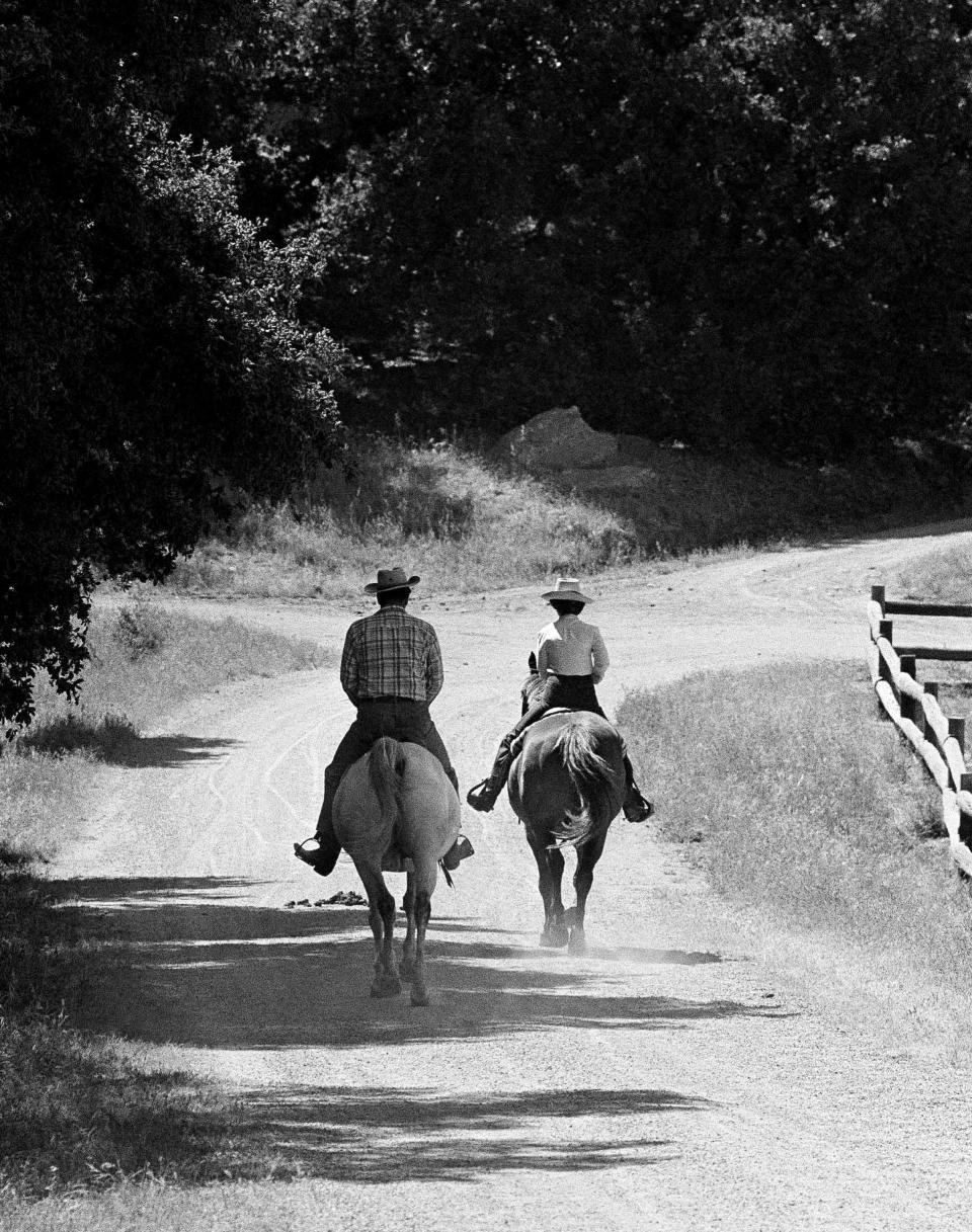 FILE - In this June 6, 1980 file photo, Ronald Reagan and wife Nancy on horseback at their ranch in Calif., north of Santa Barbara. Former Associated Press photographer Walt Zeboski, who chronicled California politics for 30 years and Ronald Reagan’s 1980 presidential campaign, died at age 83 Monday. (AP Photo/Walt Zeboski)