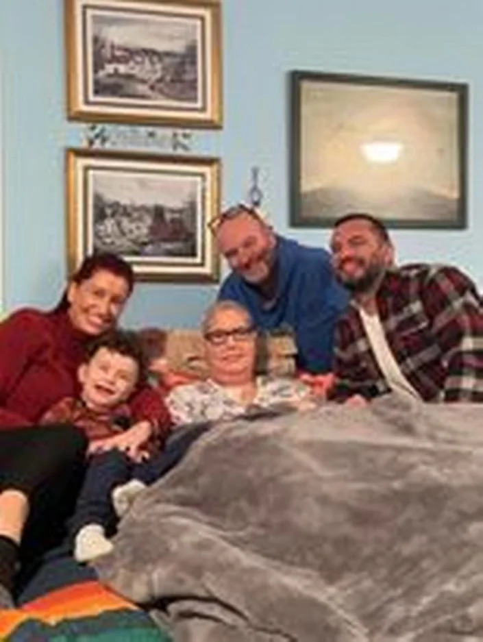 Gwen Starkey never fully recovered from COVID-19. She spent the last year at home in bed. This is one of the last photos of her with family members in December.