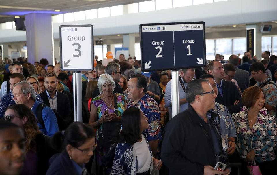 Passengers board a United Airline flight on November 7, 2017 in San Francisco, California. (Getty Images)