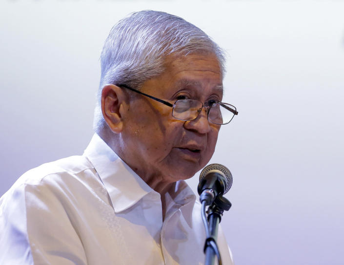 FILE - In this Friday, July 12, 2019, file photo, former Philippine Foreign Secretary Albert del Rosario delivers his speech during a forum on the South China Sea in metropolitan Manila, Philippines. He said that President Rodrigo Duterte's failure to seek Chinese compliance with an arbitration ruling has resulted in "more unlawful acts of intimidation and bullying in the South China Sea." (AP Photo/Aaron Favila, File)
