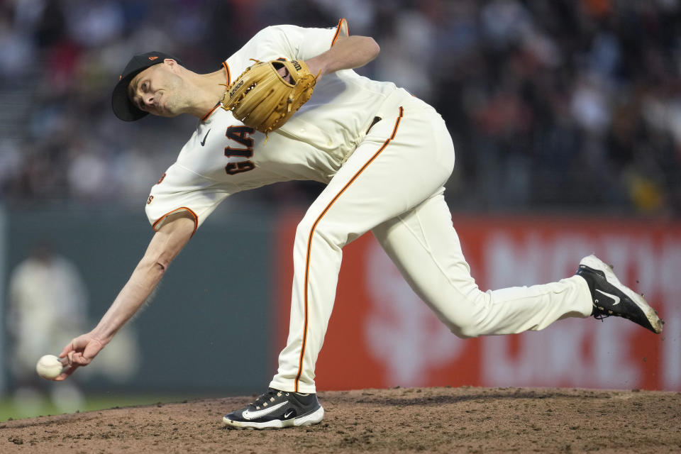 San Francisco Giants pitcher Tyler Rogers works against the Colorado Rockies during the eighth inning of a baseball game in San Francisco, Sunday, Sept. 10, 2023. (AP Photo/Jeff Chiu)